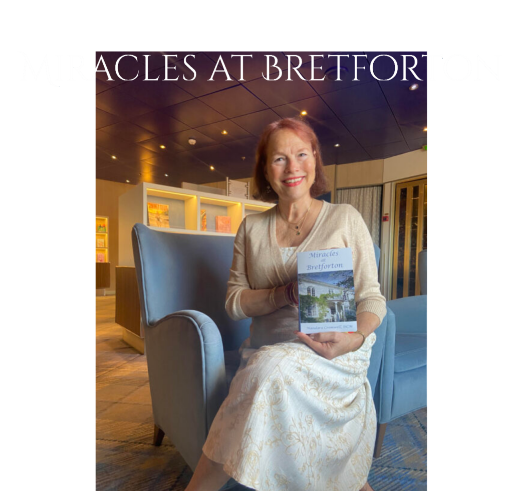 Mandara Cromwell with her book Miracles at Bretforton